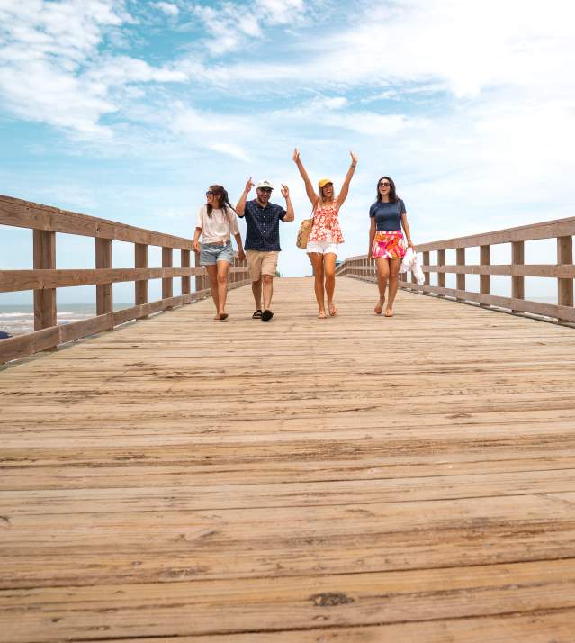 People walking on boardwalk