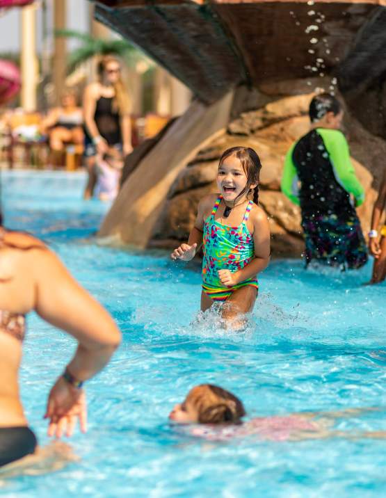 Families enjoy Parrot Island Waterpark pools during the summer.