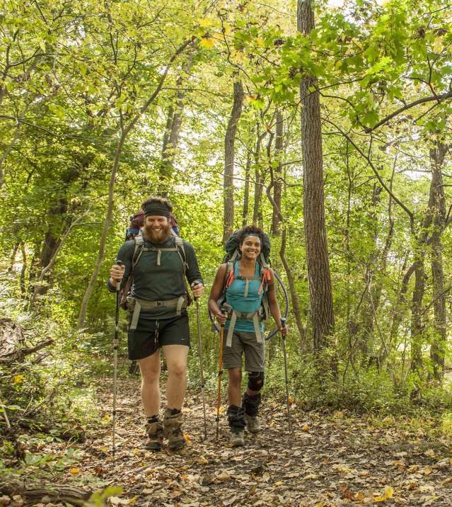 Couple with hiking gear along the Appalachian Trail