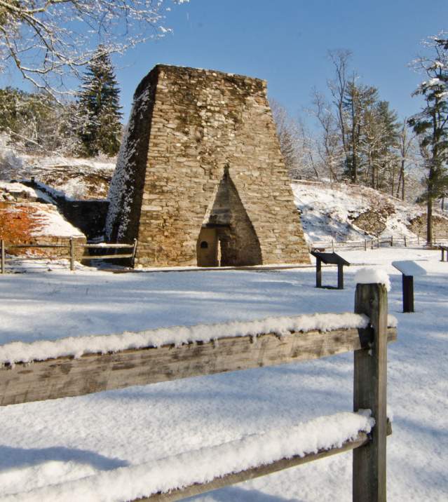 Iron furnace at Pine Grove Furnace State Park with snow on the ground.