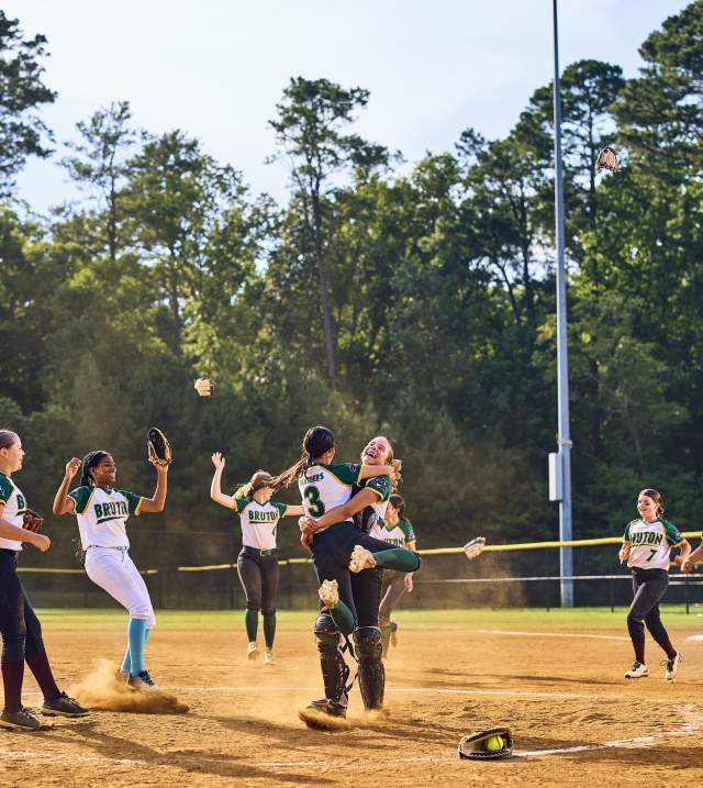 Group of Girls Celebrating a Softball Win