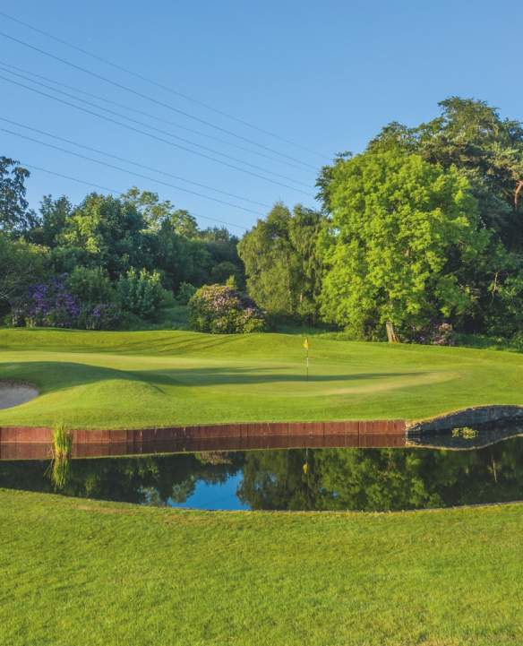 View of one of the holes at Clandeboye Golf Club on a sunny day