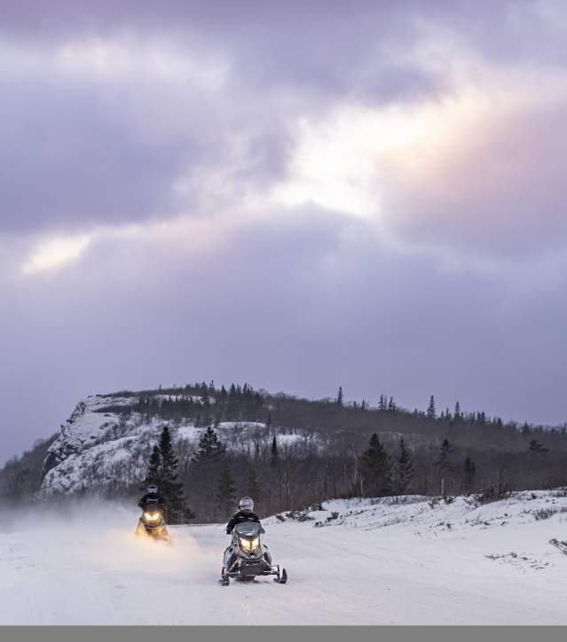 Snowmobiles on trail by Cliff Range