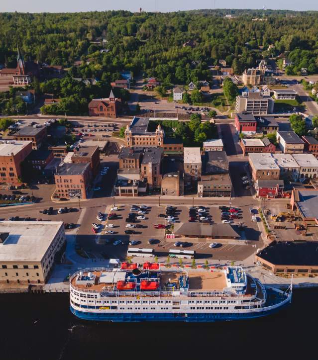 Cruise ship docks in downtown Houghton