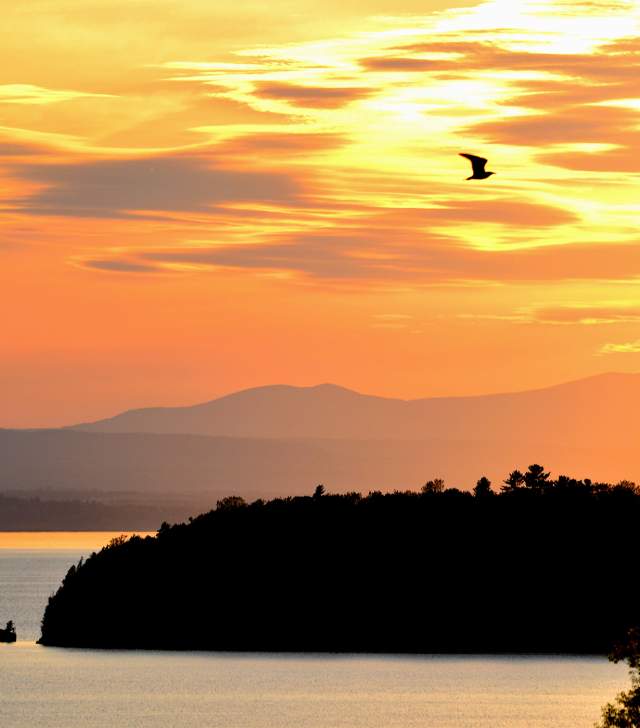Aerial view over Lake Champlain and Rock Point