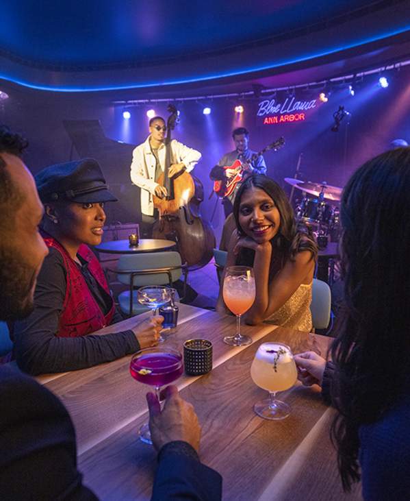 Group having drinks at Blue Llama Jazz Club show