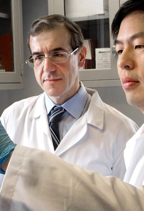 Doctors viewing specimen