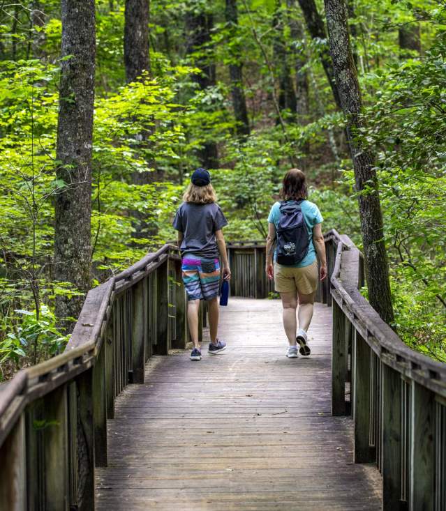 Carley and Melea walking through the paths in DeSoto State Park.