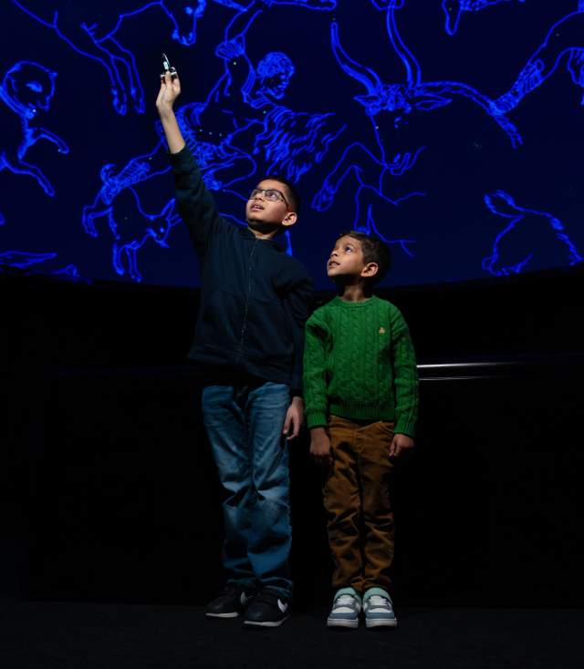 Children enjoying the planetarium at Science Central in Fort Wayne, Indiana.