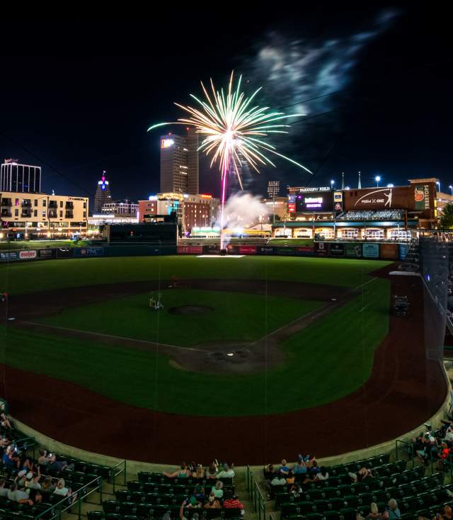 Wide angle view of the fireworks after a Fort Wayne TinCaps Baseball game at night.