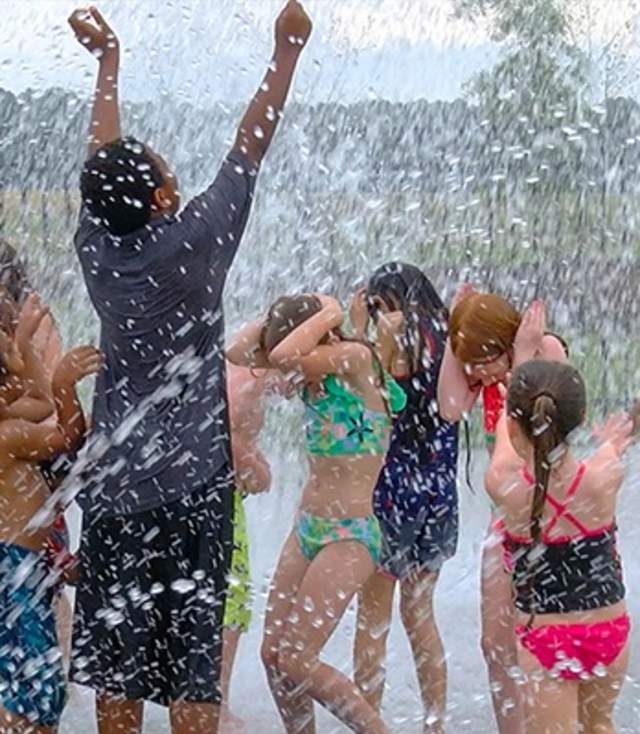 Children playing in a Splash Pad