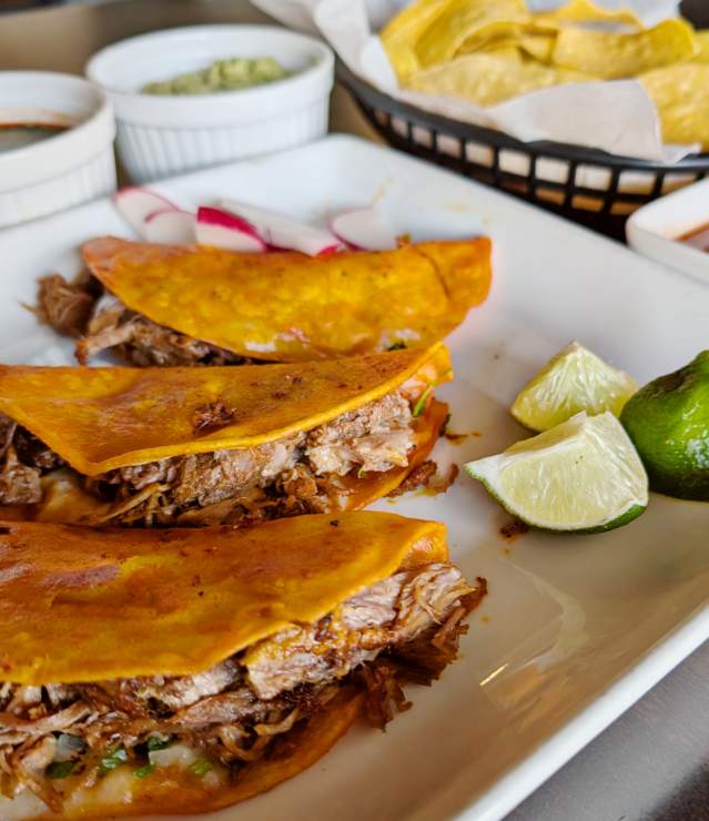 Birria Tacos at Good Bites Mexican Grill with chips and guacamole