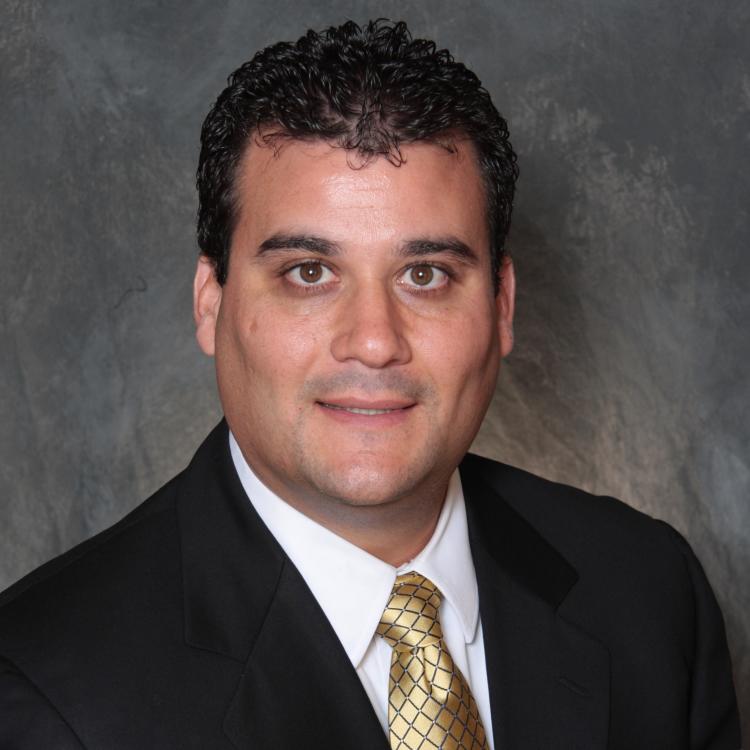 Headshot for 2021 Visit Orlando Board of Director Chris Mueller