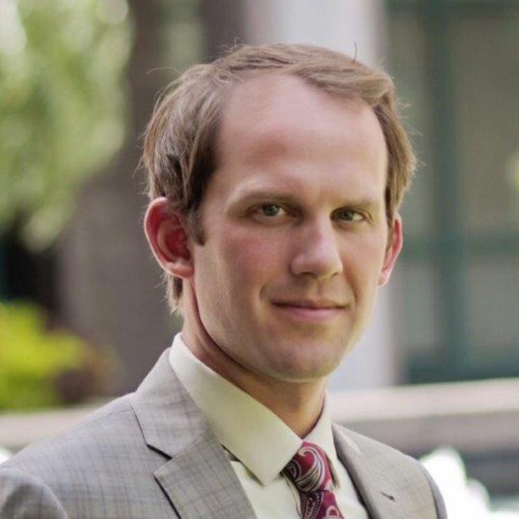 Headshot for 2021 Visit Orlando Board of Director Evan Wyant