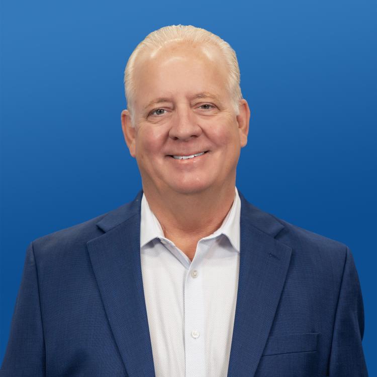 Headshot of Visit Orlando Board Member David Lutz
