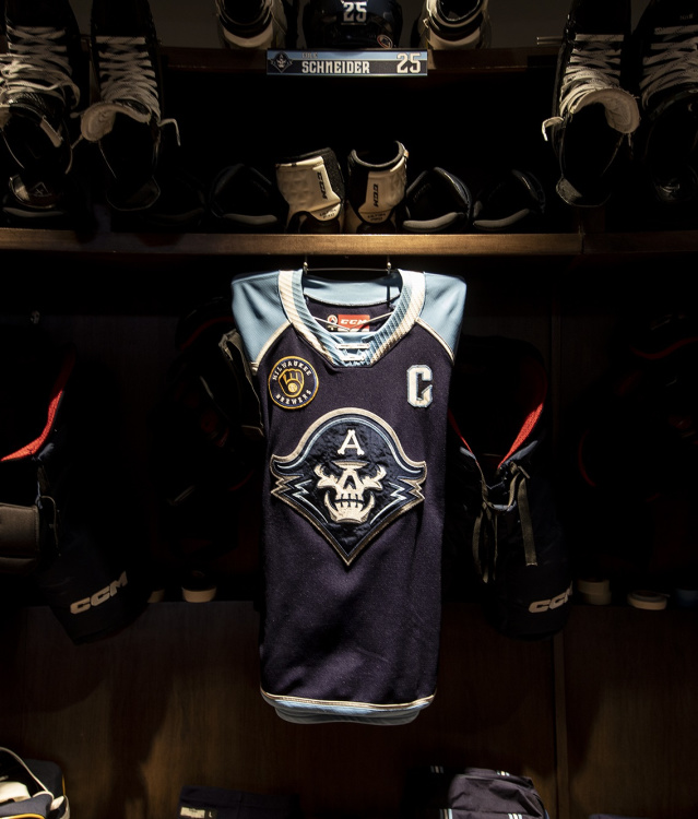A close up of the Milwaukee Admirals jerseys within the locker room