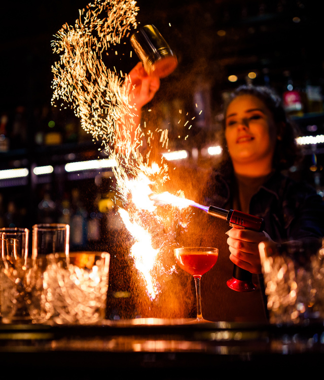 exciting cocktail being made with flame