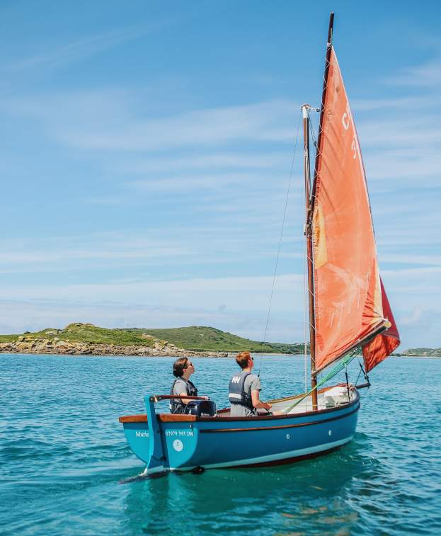 Family sailing around the islands