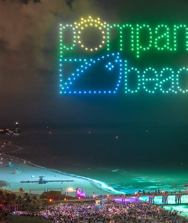 Pompano Beach logo created by drones over the ocean north of the Fisher Family Pier
