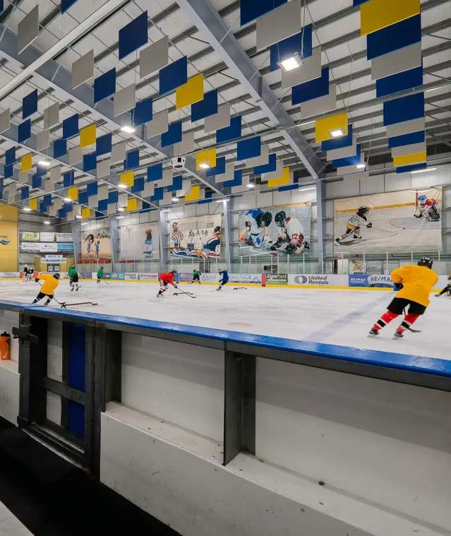 People playing hockey.