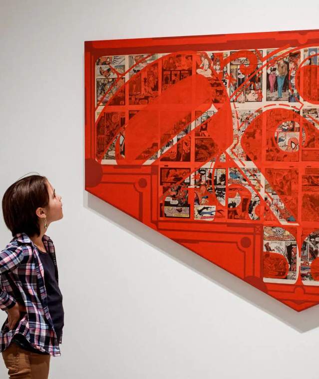 A person looking at art.