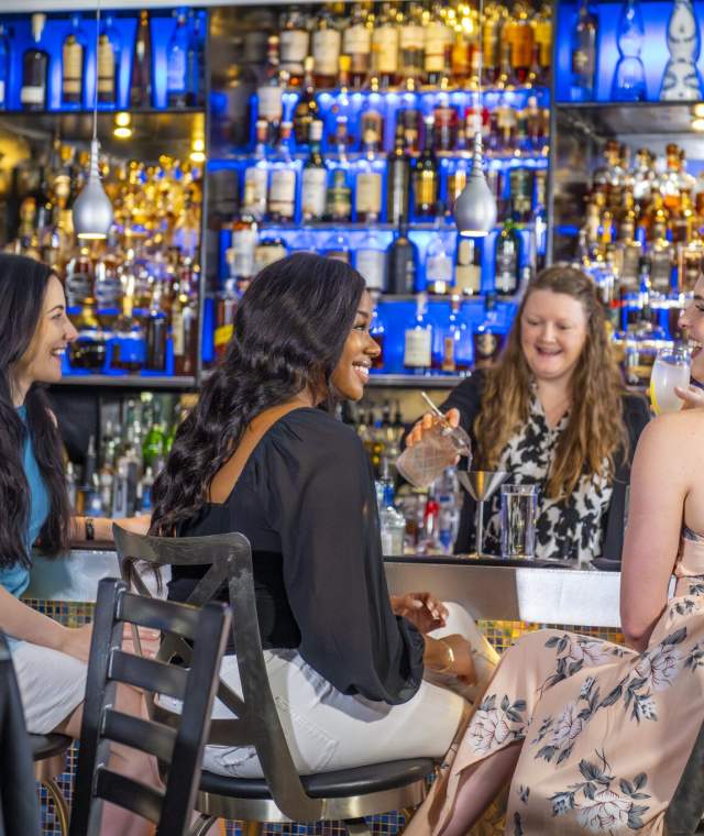 ladies having a drink at Sea Blue Bar