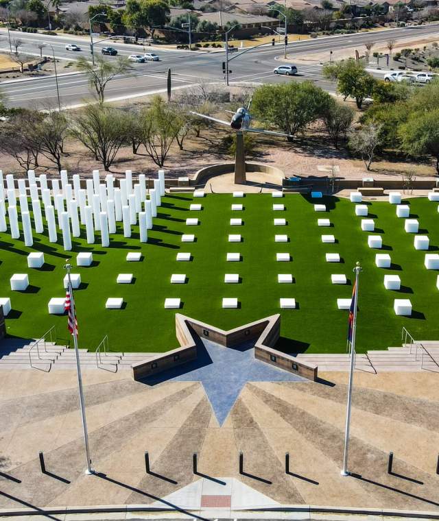 Field of Honor aerial view from Veterans Oasis Park with white pillars in a field resembling the US flag and a star shaped viewing area.
