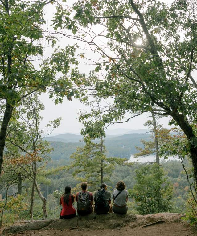 Group of friends on the summit of Stewart Mountain
