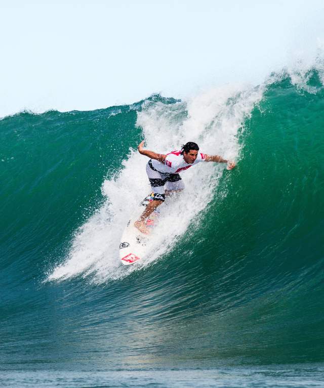Surfing a big wave at Isla Colón Bocas del Toro Province