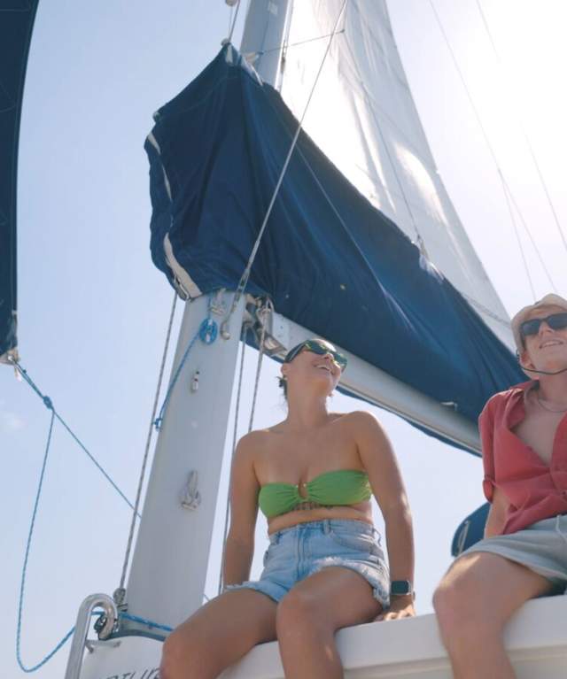 Couple enjoying a sailing trip in the Pacific waters of West Panama Province.