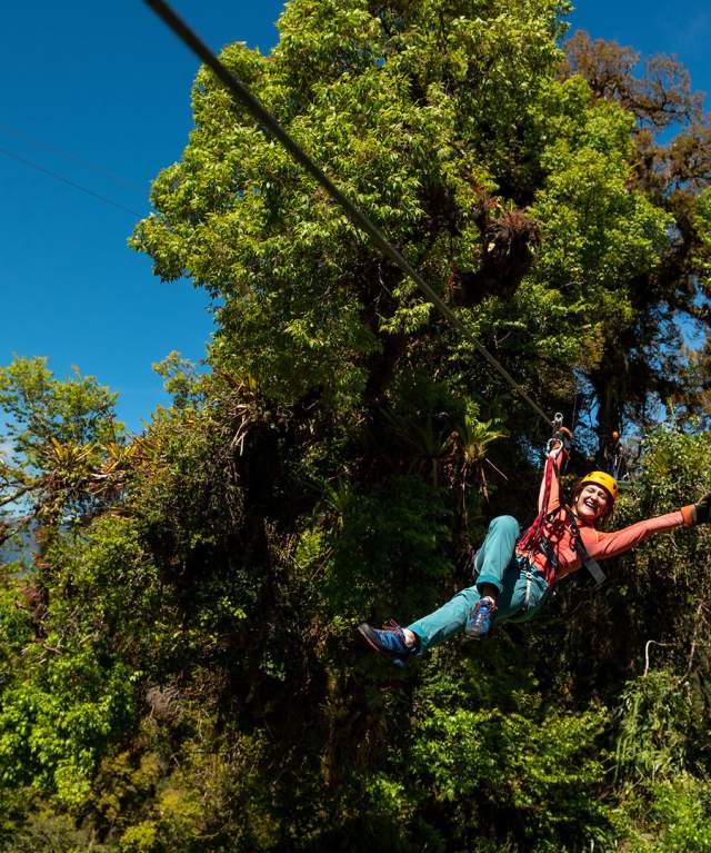 Woman happy enjoy while zip lining at Boquete