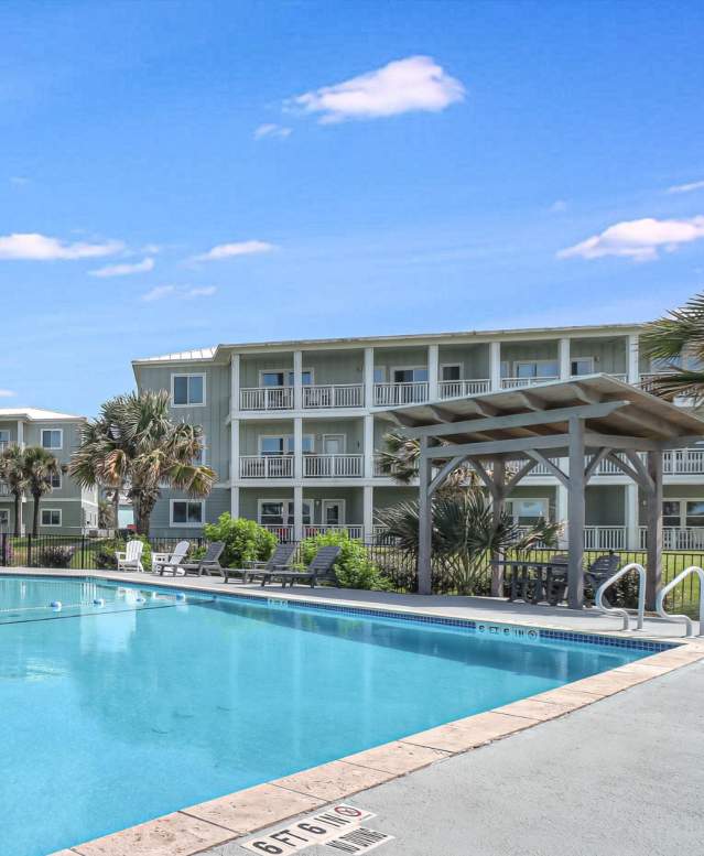 The Pelican Condominium & Beach House Banner