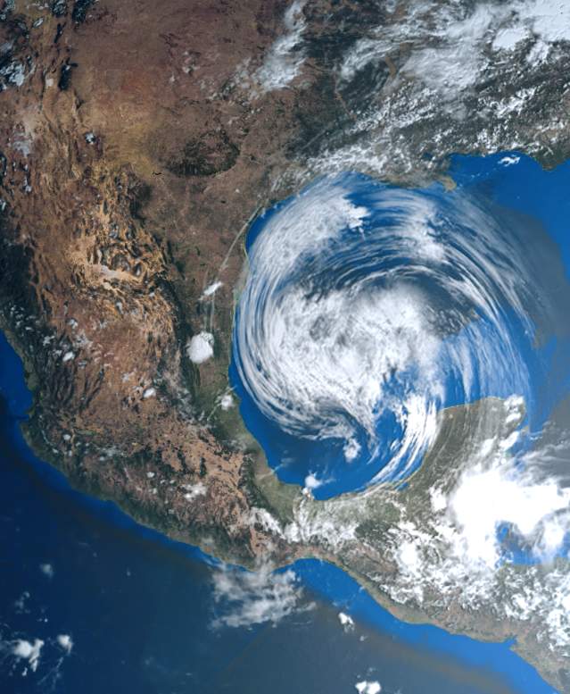 Satellite image of a hurricane that looks like a white vortex approaching the Gulf Coast of the United States and Mexico