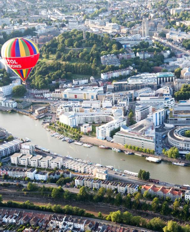 A balloon flying over Bristol Harbourside during the Bristol Balloon Fiesta - credit Paul Box