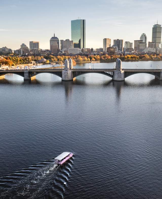 An aerial view of the Charles River with Boston in the background