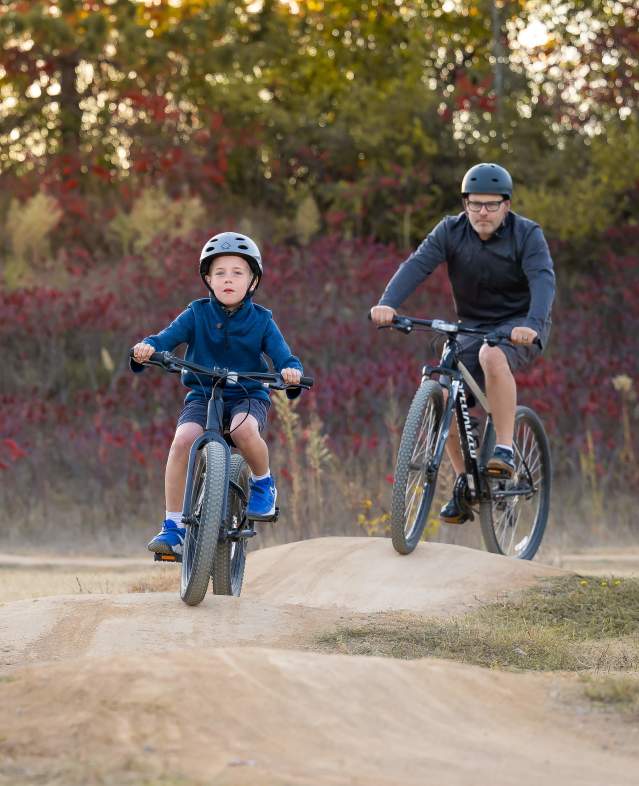 Father and son biking