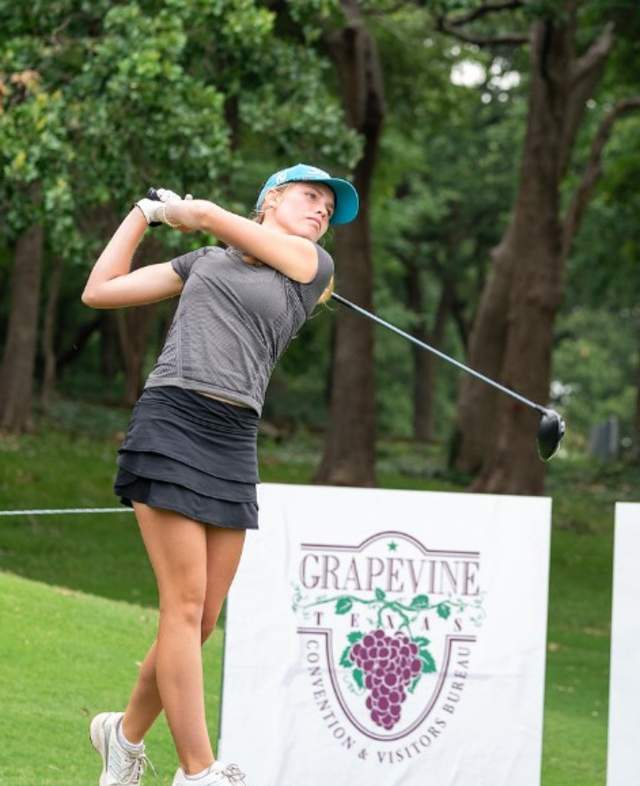 Golfer taking a shot during the Destination Grapevine Texas Women's Open in Grapevine, Texas
