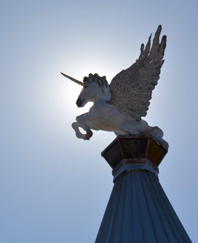 Imagine Statue on the Grapevine CVB building