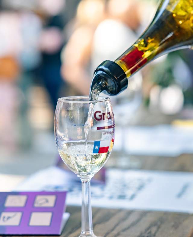 Wine being poured during GrapeFest in Grapevine, Texas