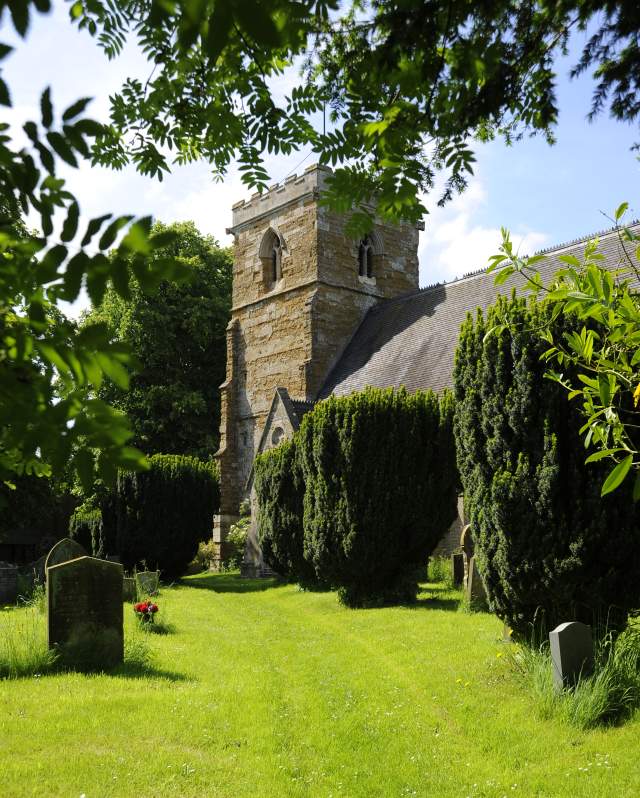 The outside of a church in Lincolnshire with grass in the foreground