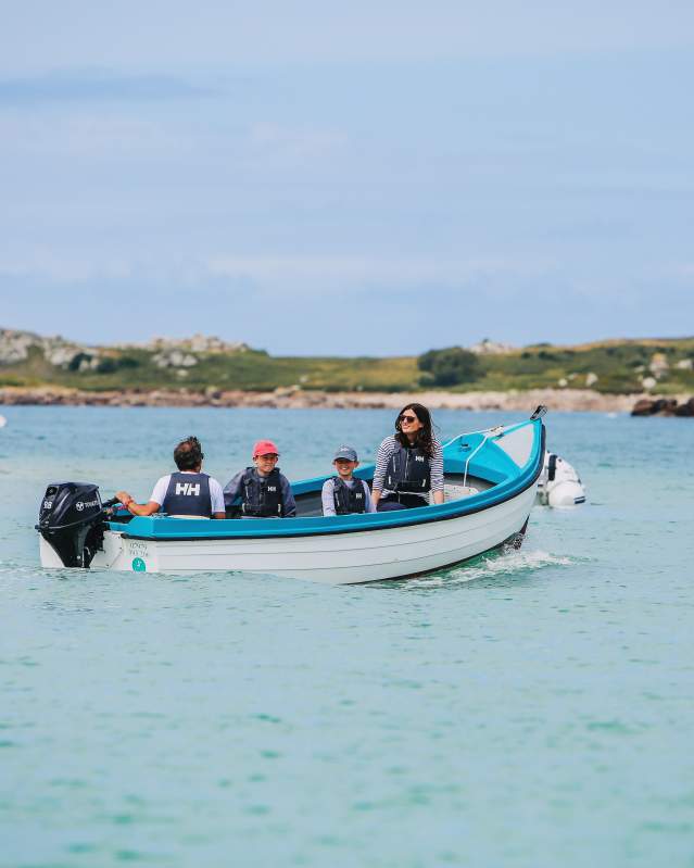 Family on a boat around Bryher