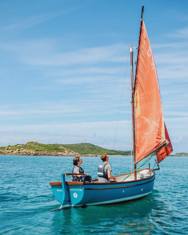 Family sailing around the islands