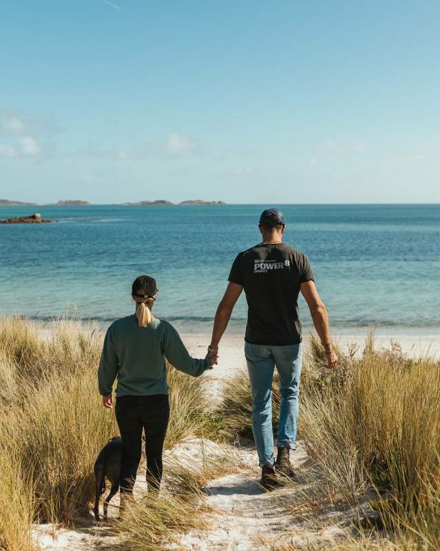 Couple walking to the beach