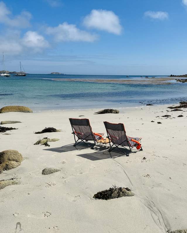 Two chairs on a beach