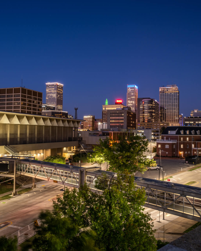 The Cox Business Convention Center with downtown Tulsa in the background