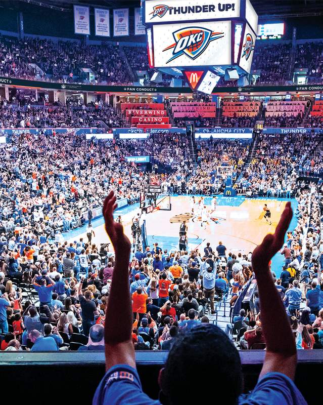 Crowd cheering on the Oklahoma City Thunder basketball team at Chesapeake Energy Arena