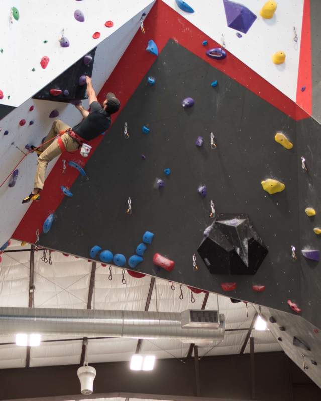 Man rocking climbing at Summit Climbing Gym in Oklahoma City
