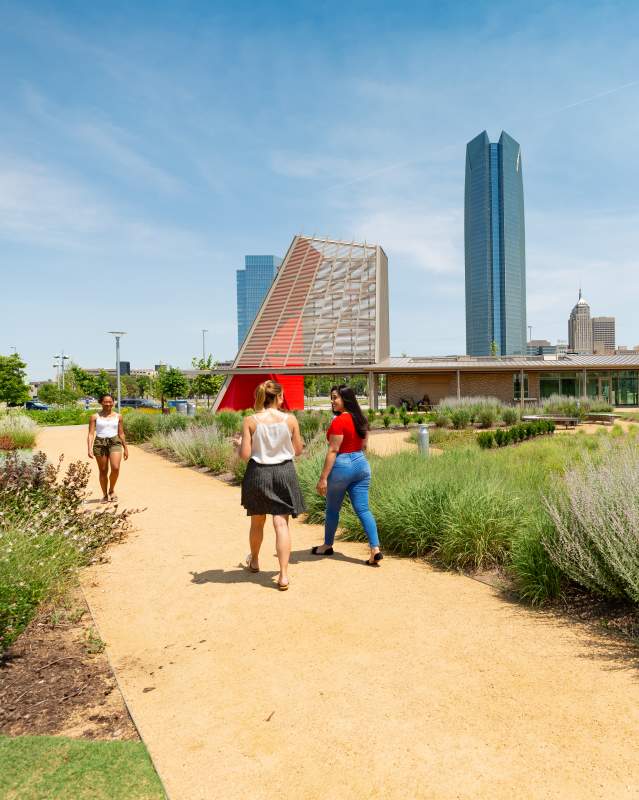 People walking around Scissortail Park in Dowtown OKC