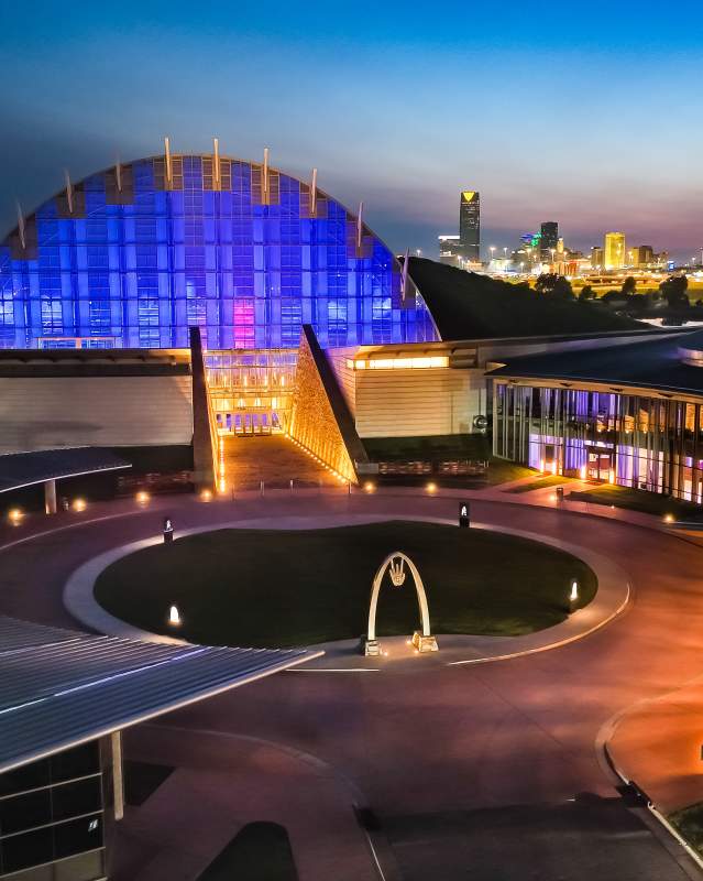 Skyline view of the First Americans Museum and Downtown OKC skyline at night
