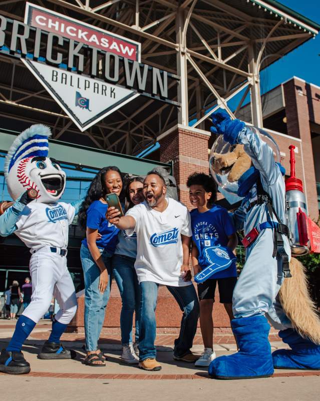 Fans taking a photo at the OKC Comets game